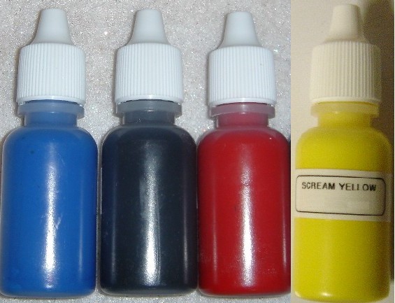 1/2 ounce bottle human quality tattoo ink available in purple, red, 