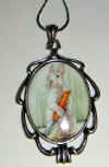 cameo-40x30-rabbitCarrot.jpg (69122 bytes)