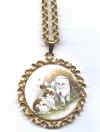 cameo_BunnyKitten_GoldRndFiligre.jpg (67252 bytes)