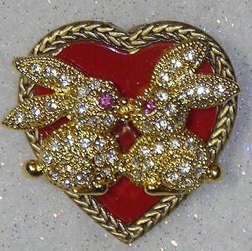 http://www.bunnyrabbit.com/jewelry/pinsbyKen/HeartKissBunnies.jpg